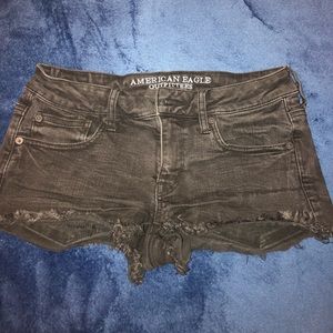 Distressed black denim shorts